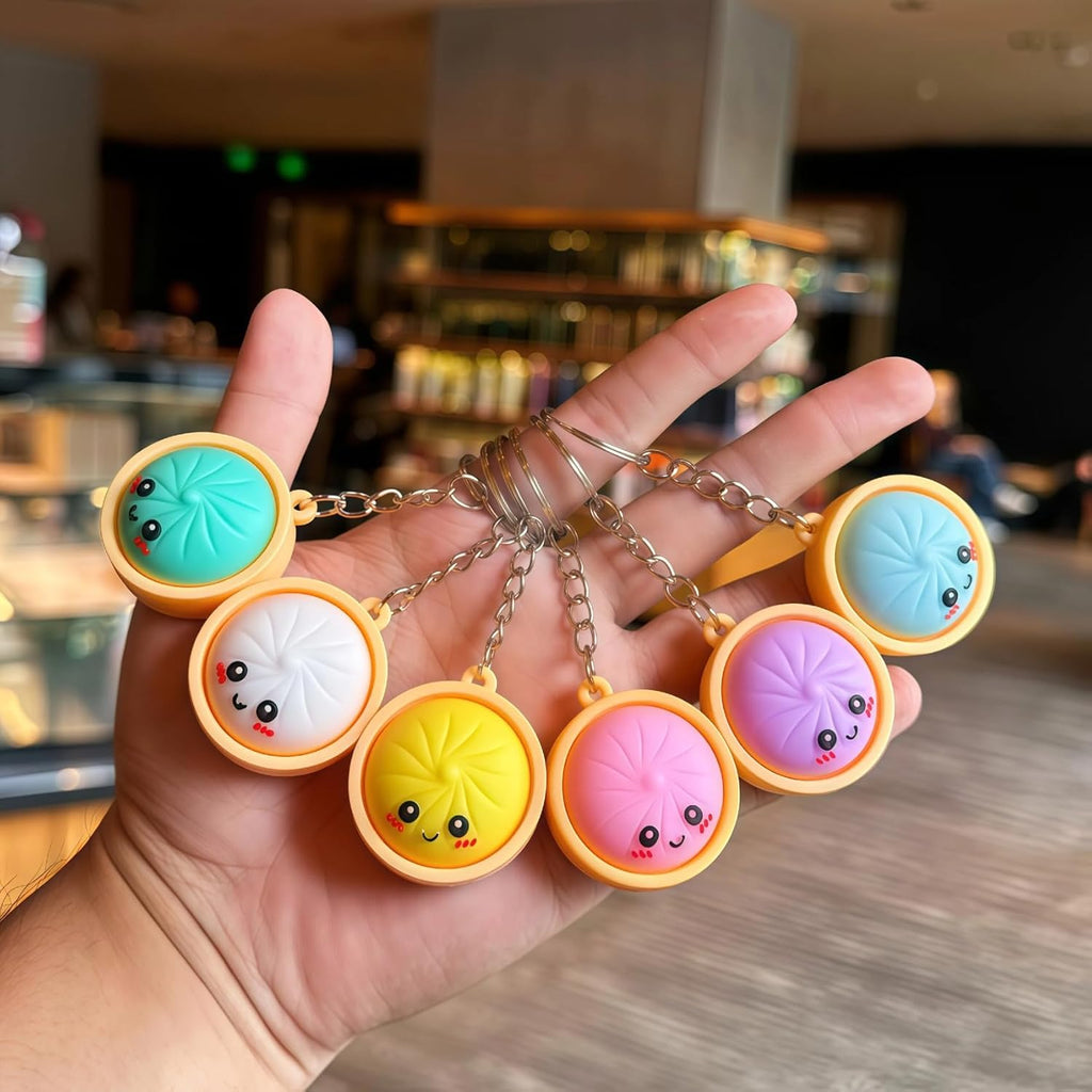 Glowing Dumpling Keychain, Fidget Clicker Keychain (Colours May Vary)